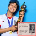 Mallory Swampson with gold medal for FIFA World cup.