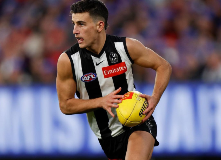 Nick Daicos Running With His Ball