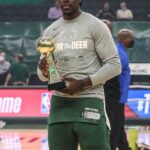 Jrue Holding A Trophy