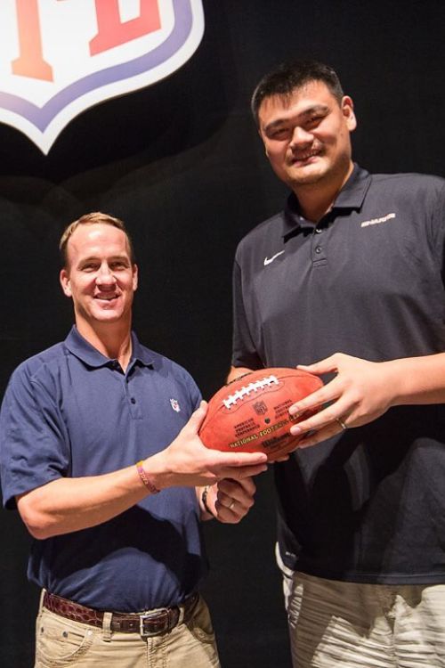 Yao Ming With NFL Legend Peyton Manning During A Ceremony In 2016