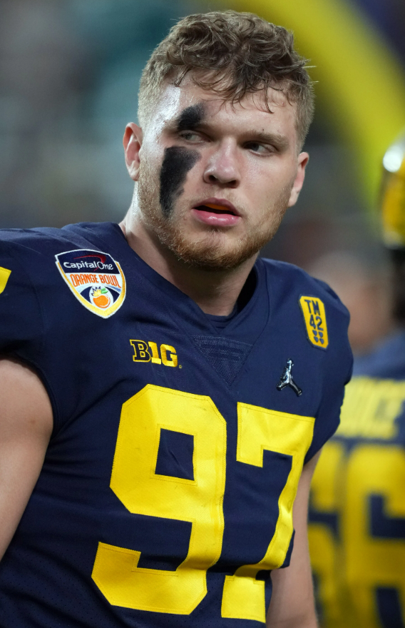 Adian playing for Michigan 