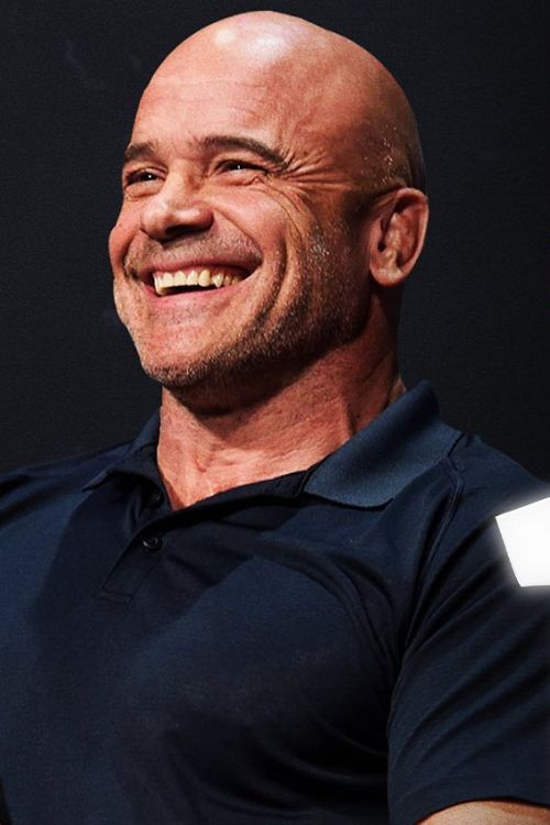 Bas Rutten Smiling During An Event