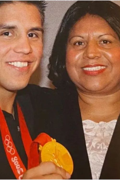 Cejudo Flaunting His Olympic Gold Medal With His Mother