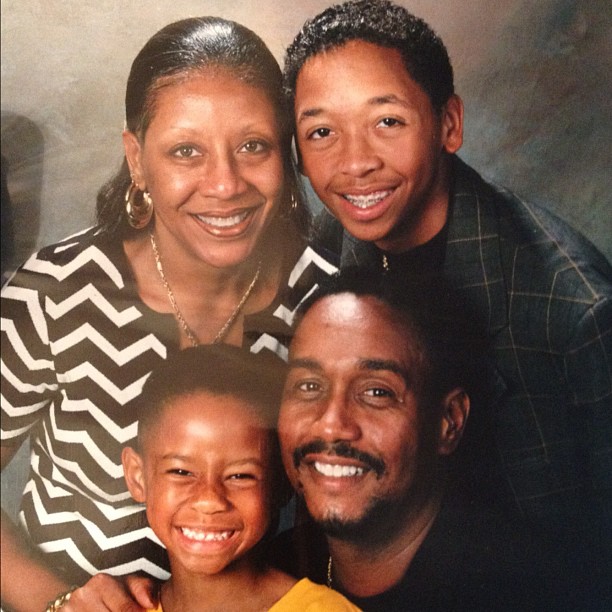 Chris Photographed During His Childhood With His Parents And Brother