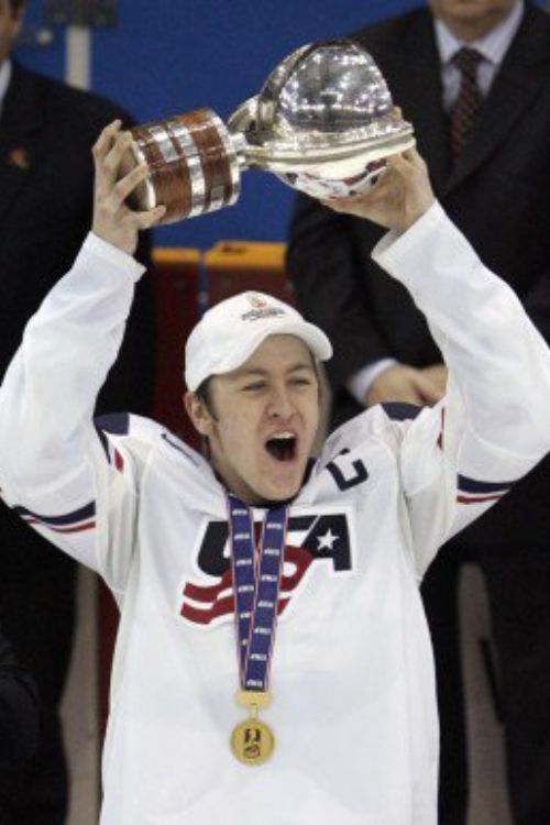 Derek Stepan Lifting A Trophy For The US Team
