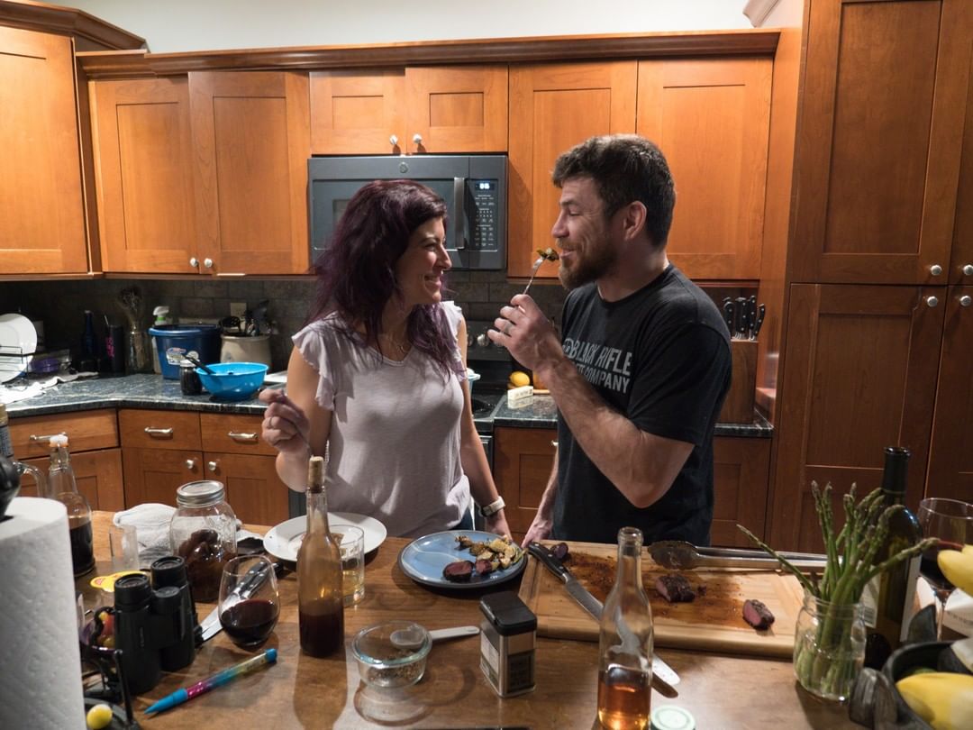 Jim Miller And Angel Miller Enjoying Cooking Together