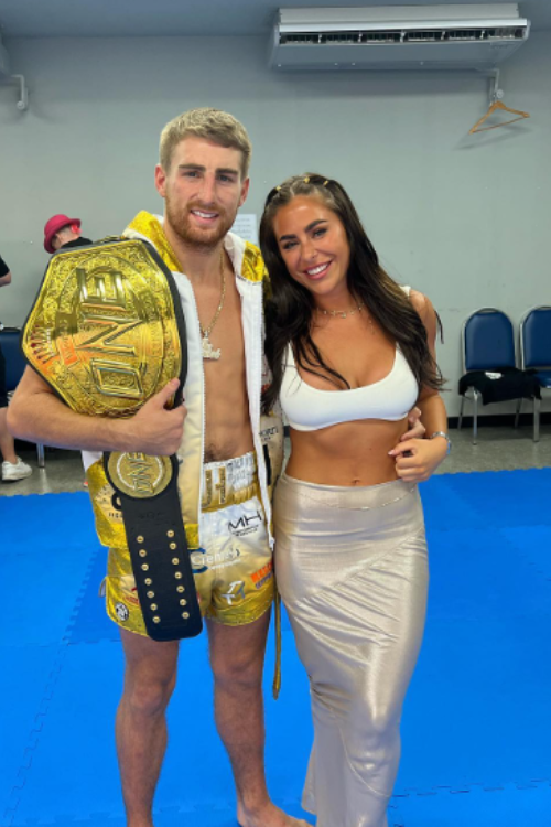 Jonathan posing with Kenz after the match