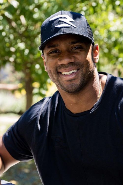 Russell Wilson Poses For A Photo