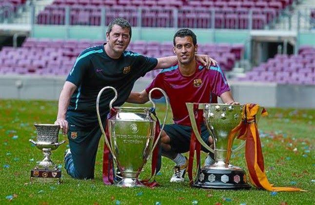 Sergio Busquets with his father celebrating the victory