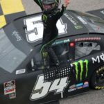 Ty Gibbs Celebrating His Win By Standing On His Car