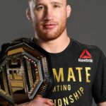 Justin With His UFC Belt