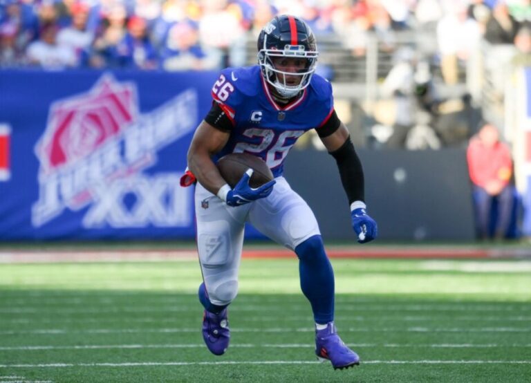 NFL player Saquon Barkley Playing
