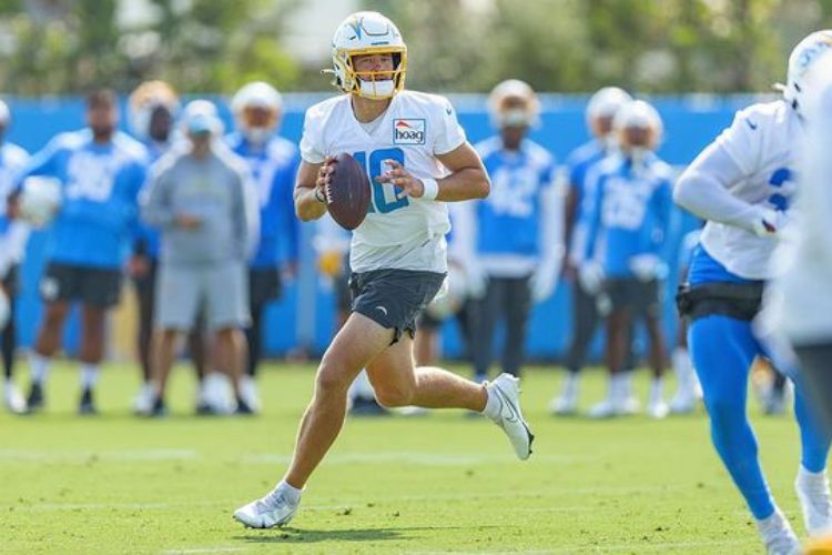 Justin Herbert Playing American Football