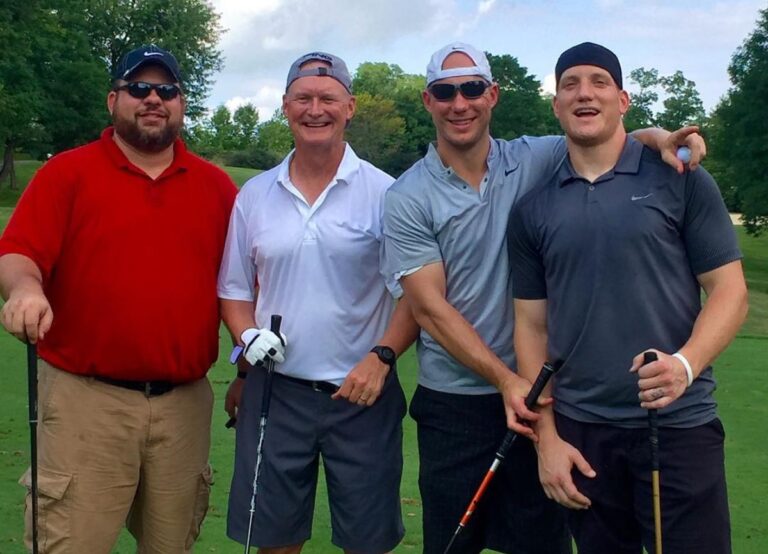 AJ Hawk(R) Pictured With His Family Including Ryan(Second From Right) And His Father, Keith