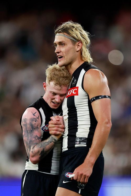 Darcy Moore Celebrates With Teammate At MCG After Winning Against Geelong