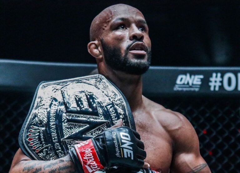 Demetrious Johnson Pictured With His One Championship Title Belt In 2019