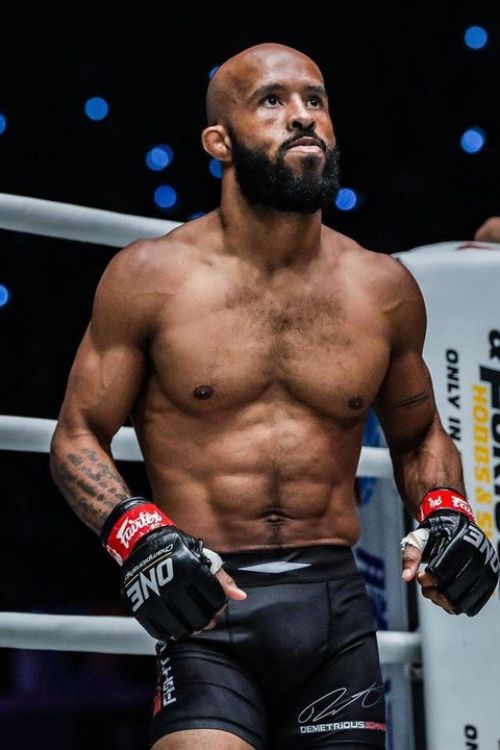 Demetrious Johnson Pictured Ring Side As He Gets Ready To Face His Opponent 