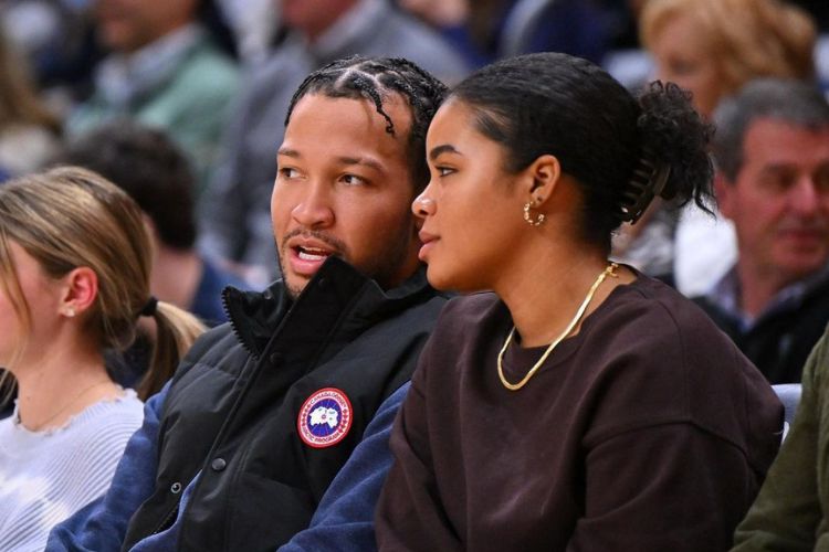 Jalen And Erica Pictured Courtside During A Basketball Game