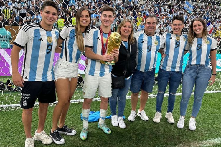 Julian Alvarez(Center) Pictured With His Family Holding The World Cup After Defeating France In The Finals At Lusail Stadium on December 18, 2022