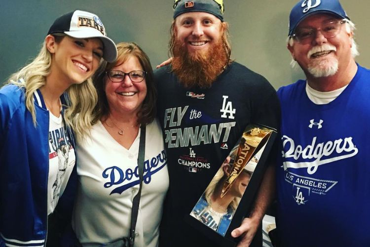 Justin Turner Poses With Parents And Wife In 2017 As He Holds The West Division Trophy