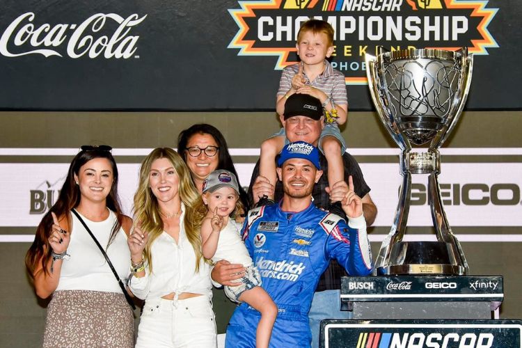 Kyle Larson Pictured With Wife Katelyn And Their Two Kids, Sister Andrea, And Parents Mike, And Janet In 2022