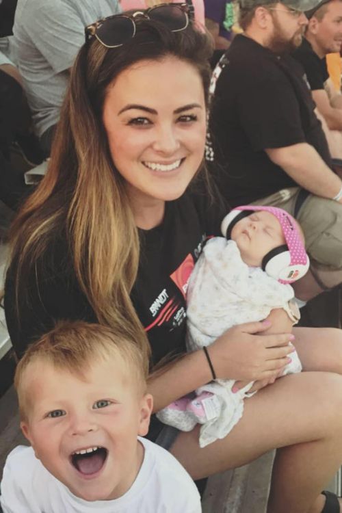 Andrea Larson With Her Niece And Nephew At A Race Car Event In 2018
