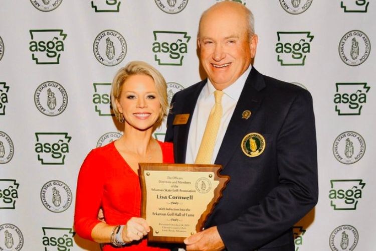 Lisa Cornwell Receiving Her Plaque After Being Inducted Into The Arkansas Hall of Fame In 2021