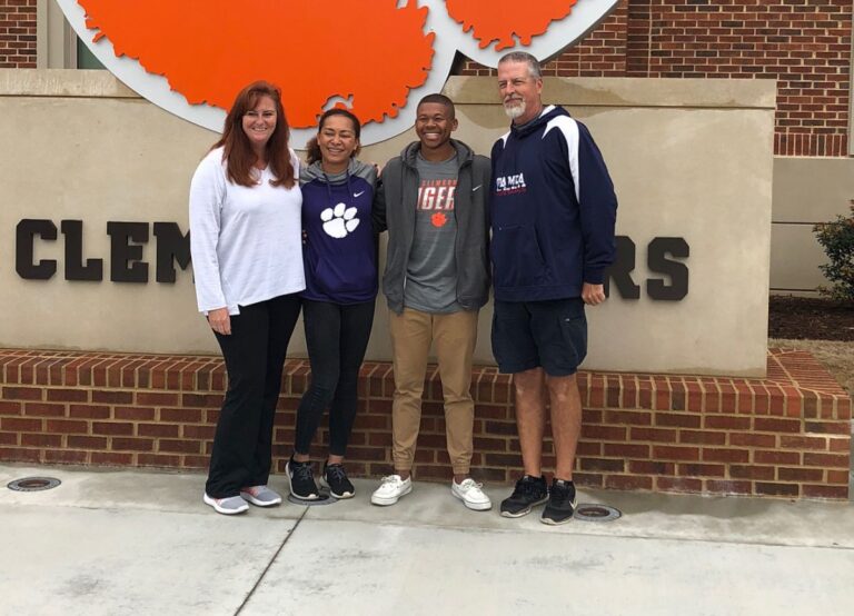 McKenzie Clark Pictured With Her Parents, Brian, And Carrie And Her Brother, Hunter Outside The Grounds Of Clemson University In 2018