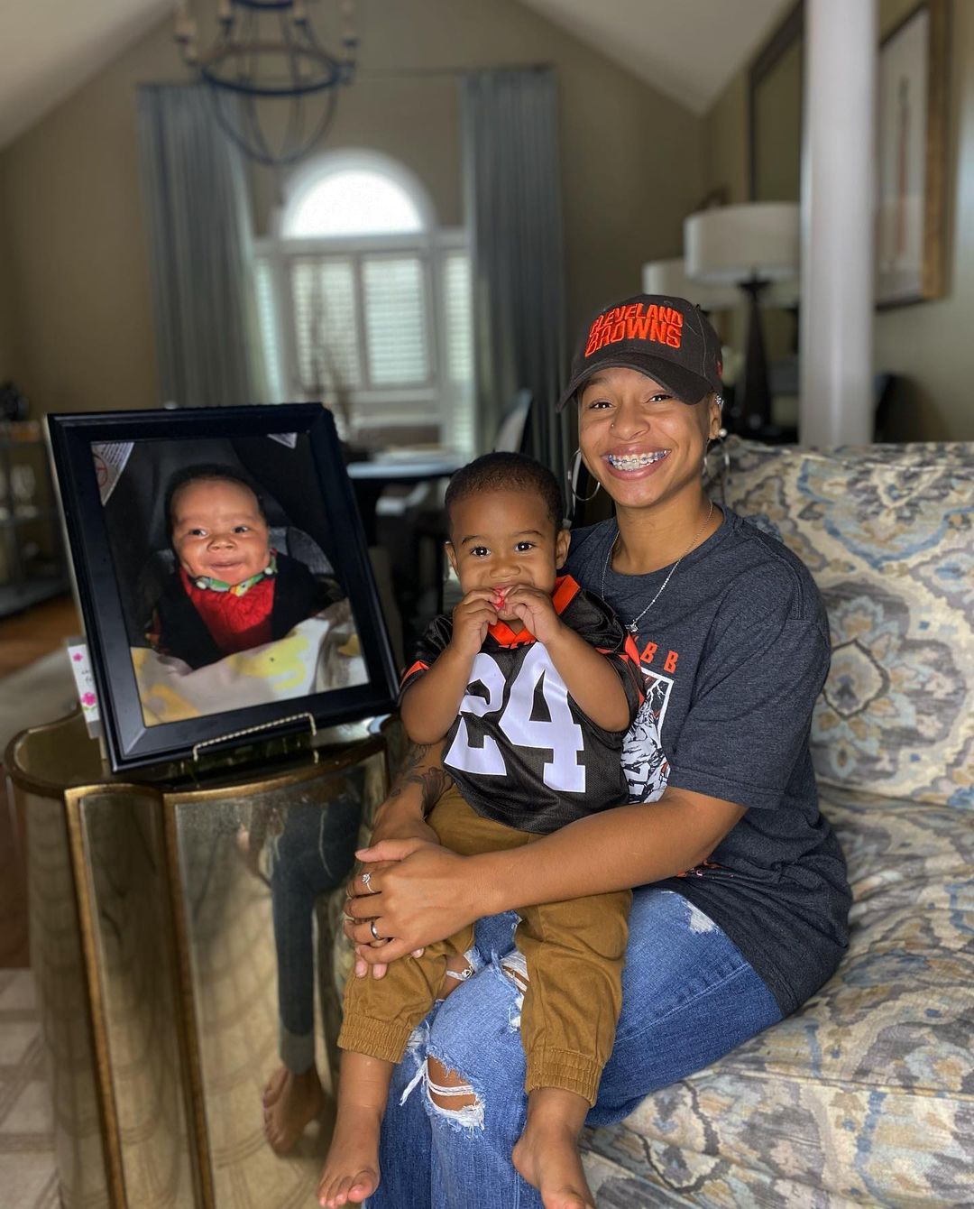 Neidra Chubb With Her Son Josiah And A Picture Of Her Late Son Jr In 2021