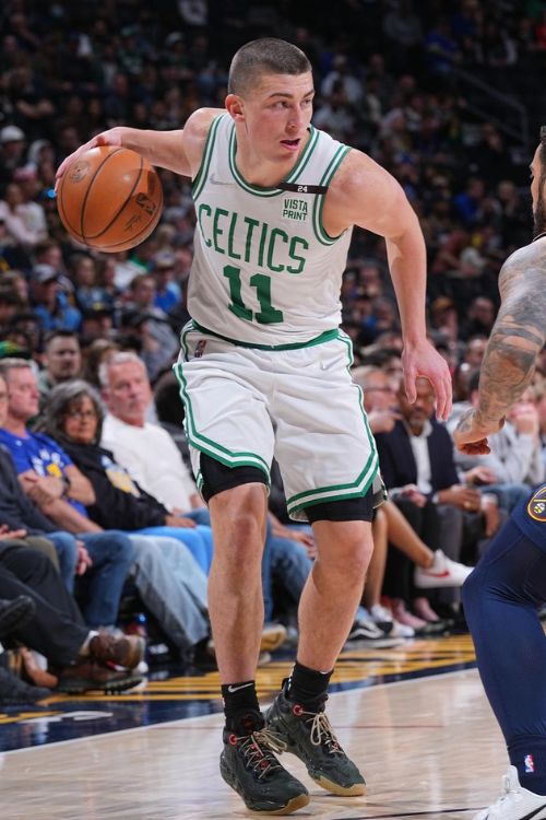 Payton Pritchard Pictured Playing Against Denver Nuggets In 2022