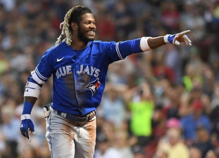 Raimel Tapia Points Towards His Teammates After Scoring A Grand Slam Against Boston Red Sox In 2022