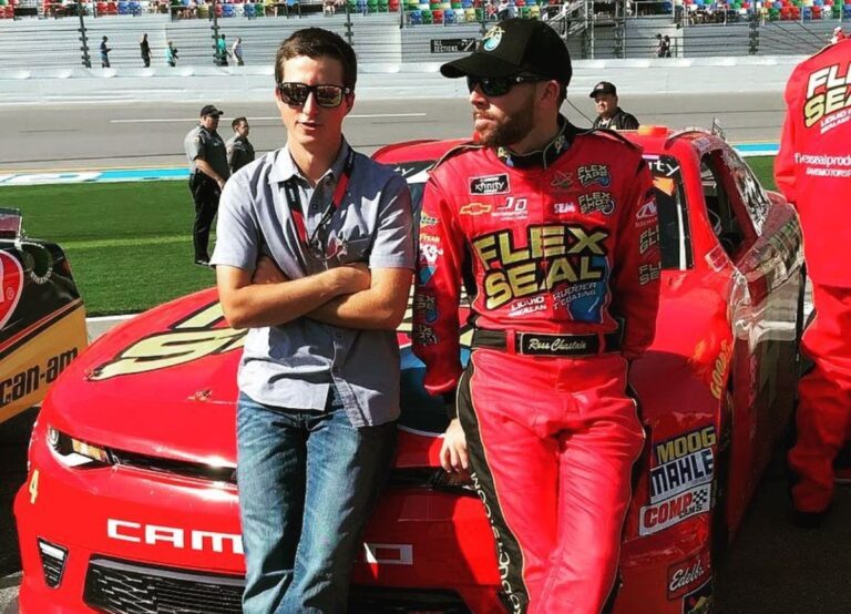 Ross And Chad Chastain Pictured Together Standing In Front Of His Car In 2018