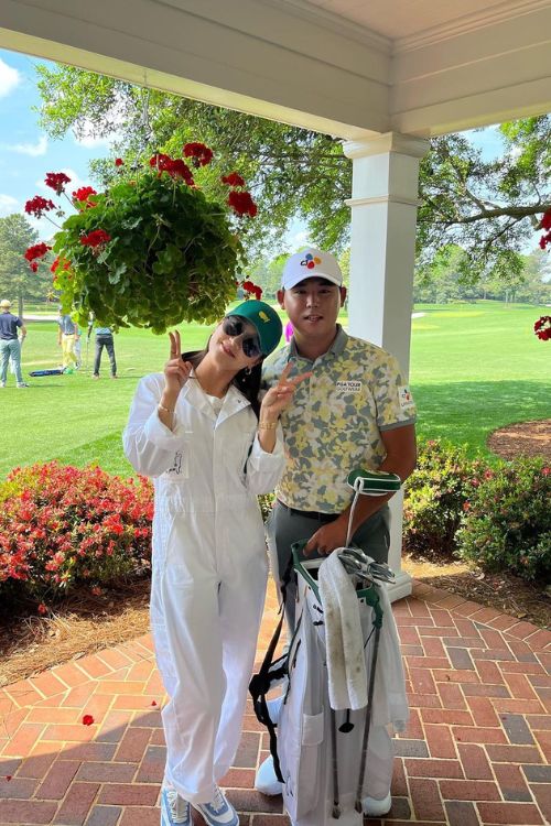 Si Woo And Ji Hyun Pose Together At The Augusta National Grounds During The Masters Tournament In April