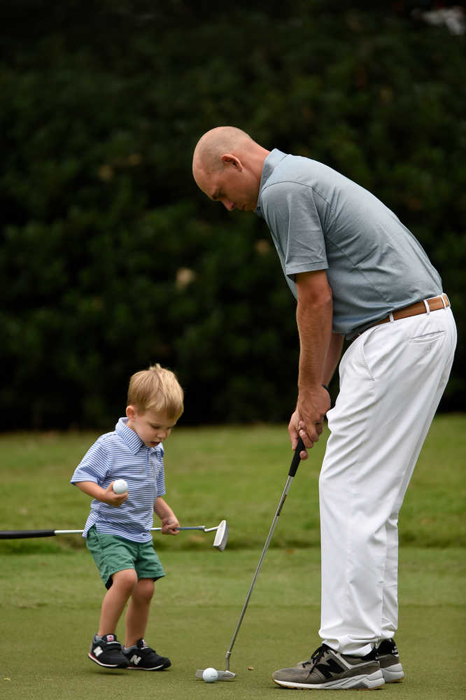 Golfer Bill Haas With His Son