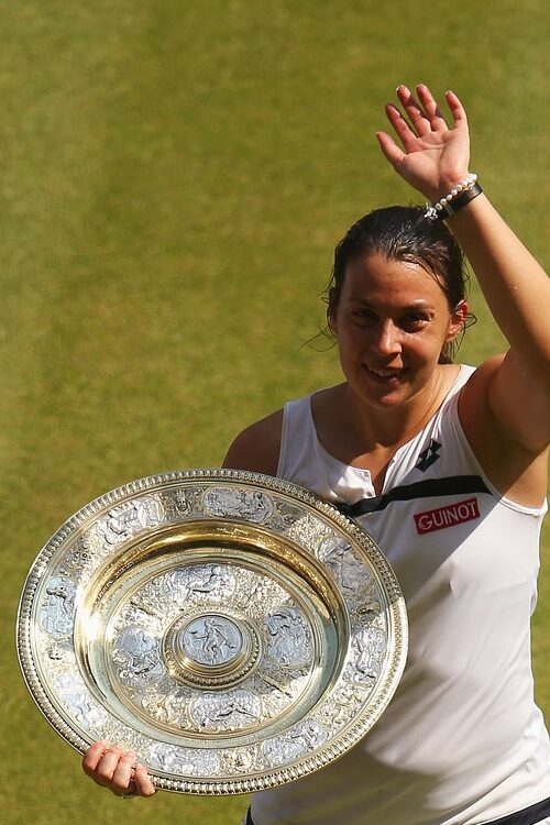 Marion Bartoli With Her Wimbledon Open Trophy In 2013 (Source: Metro UK)