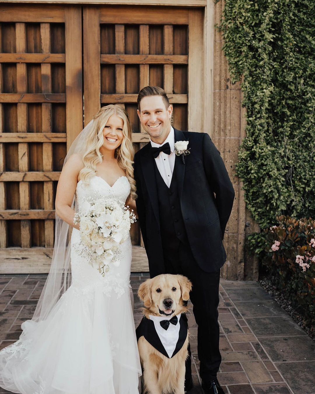 Stephanie And Kyle At Their Wedding With Their Pet Dallas