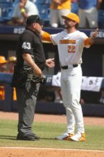 Tony Vitello celebrating with players