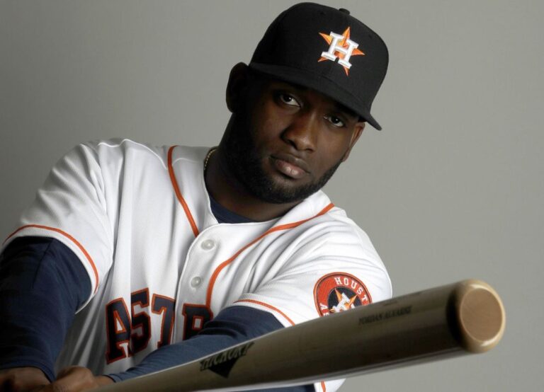 Yondan Alvarez Houston Astros Player Swinging A Shot
