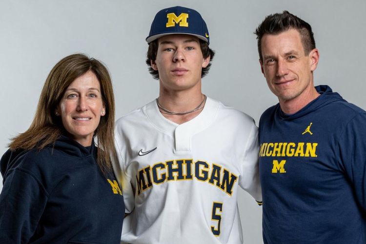 Craig And Michelle Pictured With Their Son Jack Counsell After He Commits To The University of Michigan