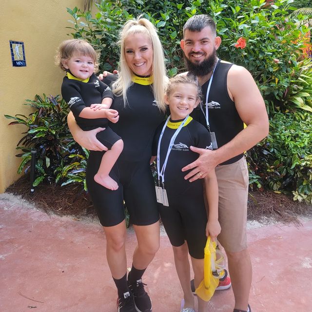Lacey Evans With Her Husband And Daughters 