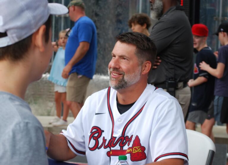 Kyle Davies Pictured Signing Autographs For Atlanta Braves' Fans In May 2023