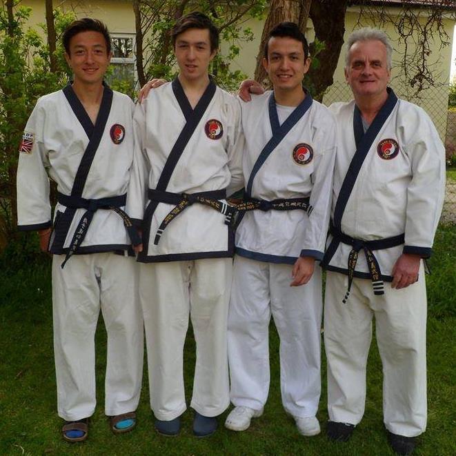 Paul Peniston Playing Karate With His Three Sons Including Ryan