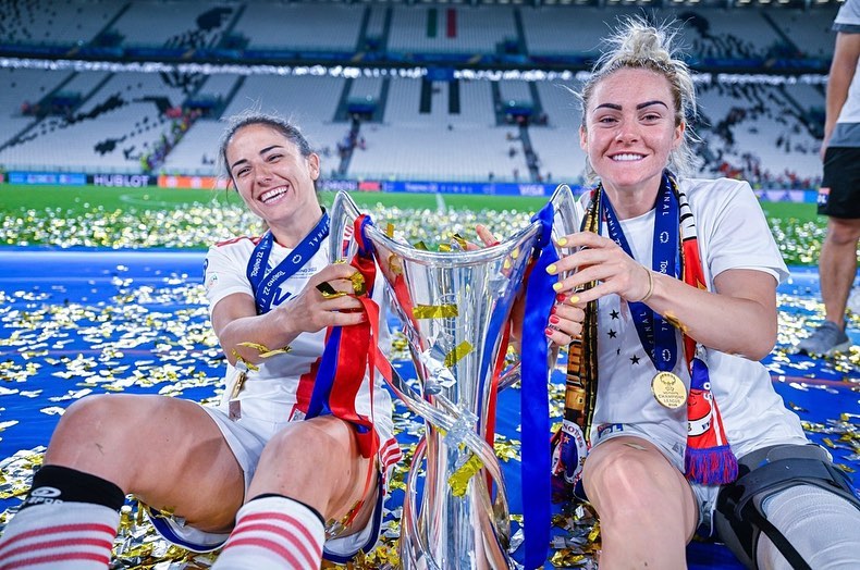 Ellie Carpenter With His Partner Danielle van de Donk Celebrating Champions League Trophy