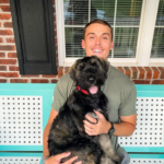 Evan Carter with his dog, JP