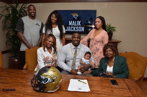 Malik Jackson Pictured With Family And Then Girlfriend Jade During His Signing With The Jaguars