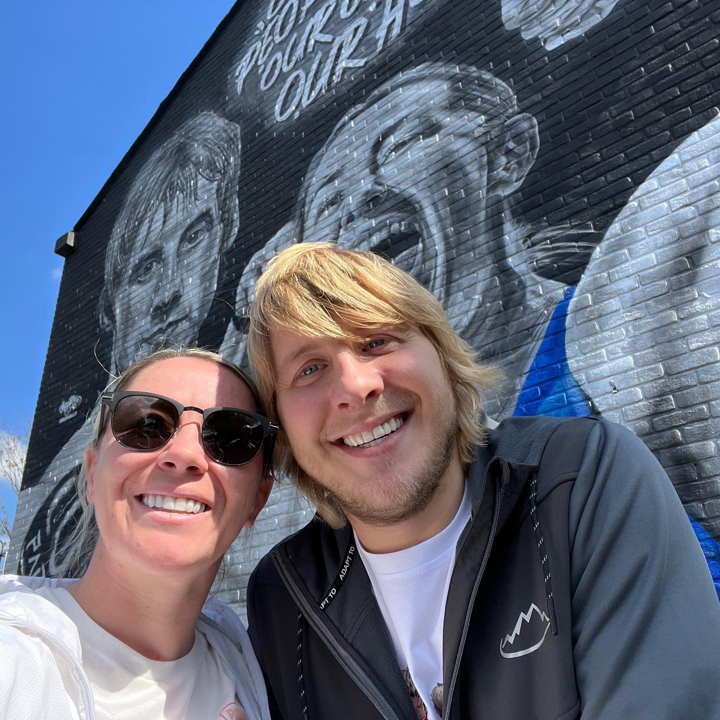 Molly McCann Infront Of Her Mural In Her Hometown With Fellow UFC Fighter Paddy Pimblett