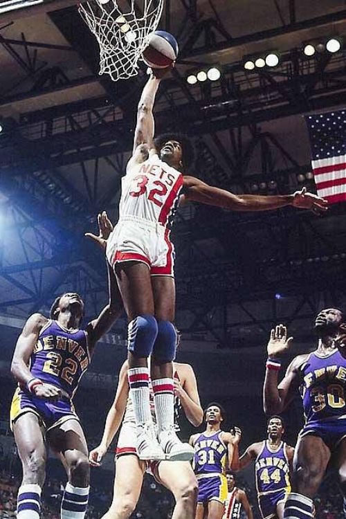 Julius Erving Makes His Famous Leap As A Nets' Player Against Denver 