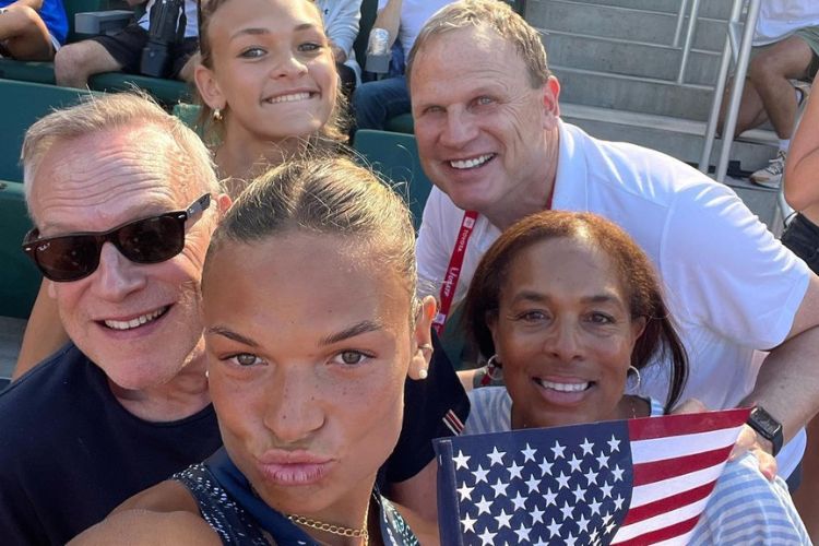 Anna Hall Pictured With Her Parents, David, And Ronette Hall(Right), Her Coach, And Her Younger Sister, Lauryn After Becoming The US Champion