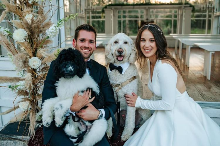 Austin Krajicek And Misia Krajicek With Their Fur Babies After Their Wedding Ceremony In 2022