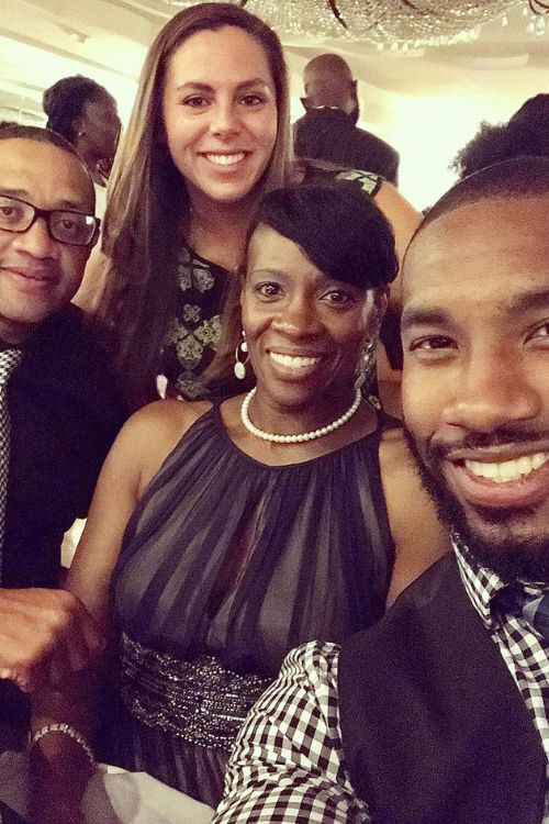 Crystal Dunn's Family Inclduing Her Parents, Vincent And Rhonda, And Her Brother Henry, And His Wife, Gian Pictured At A Family Event